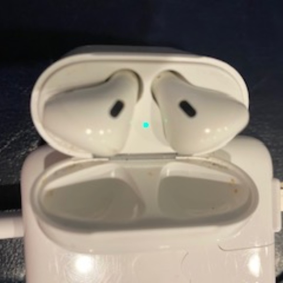 pre-owned airbuds and charging case